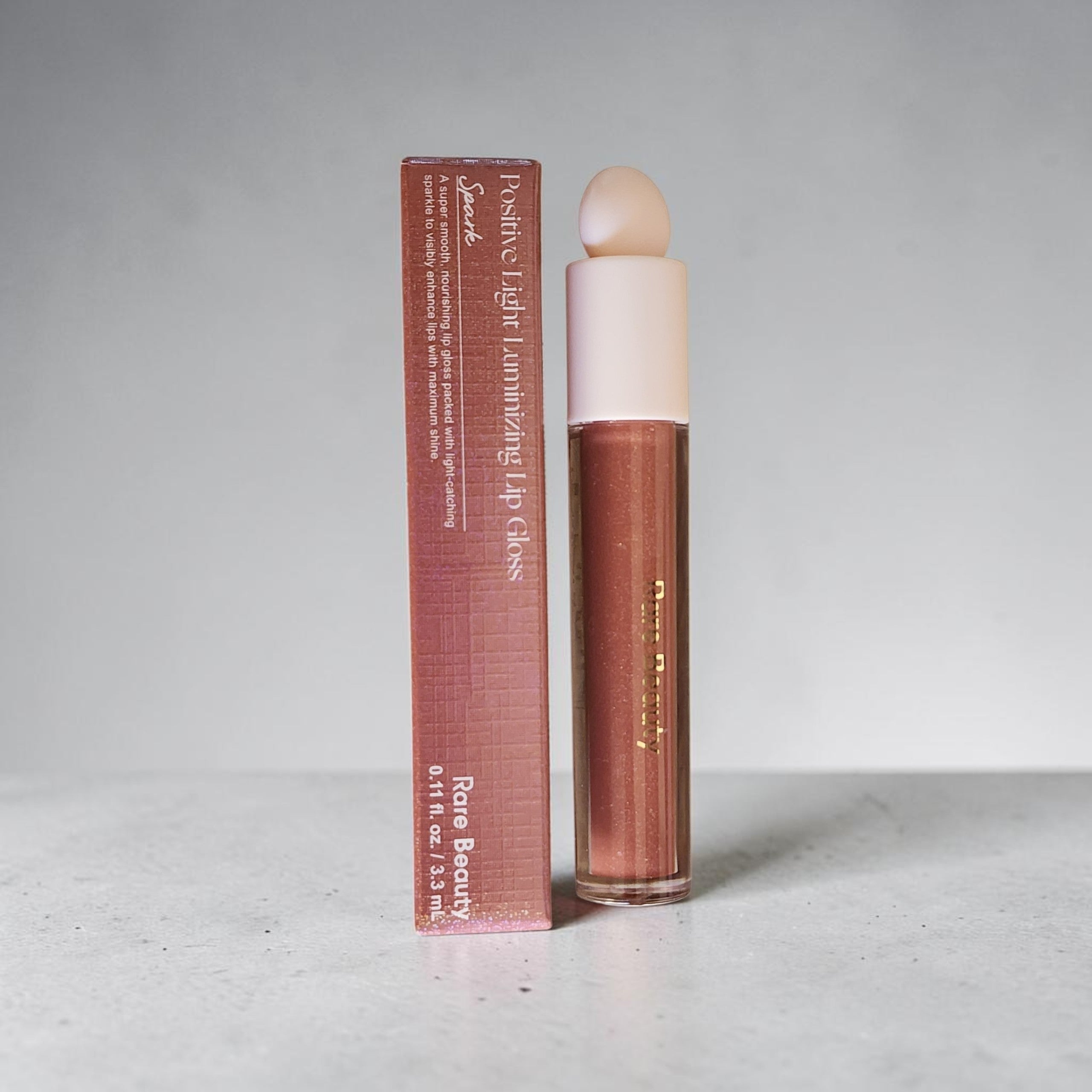 Rare Beauty Positive Light Luminizing Lip Gloss Spark - 33ml